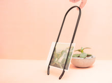 Load image into Gallery viewer, Caliper sustainable modern picture frame. Arch shaped frame, minimal and elegant. Made of recycled steel. Frame and wall display for photographs and art.

