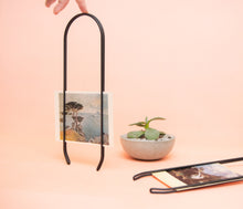 Load image into Gallery viewer, Caliper modern picture frame in black, picture wall hanger. Sustainable frame for displaying photos, art, postcards.
